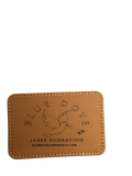 Blue Dove Laser Engraving custom leather patch with dove logo and stitched edge