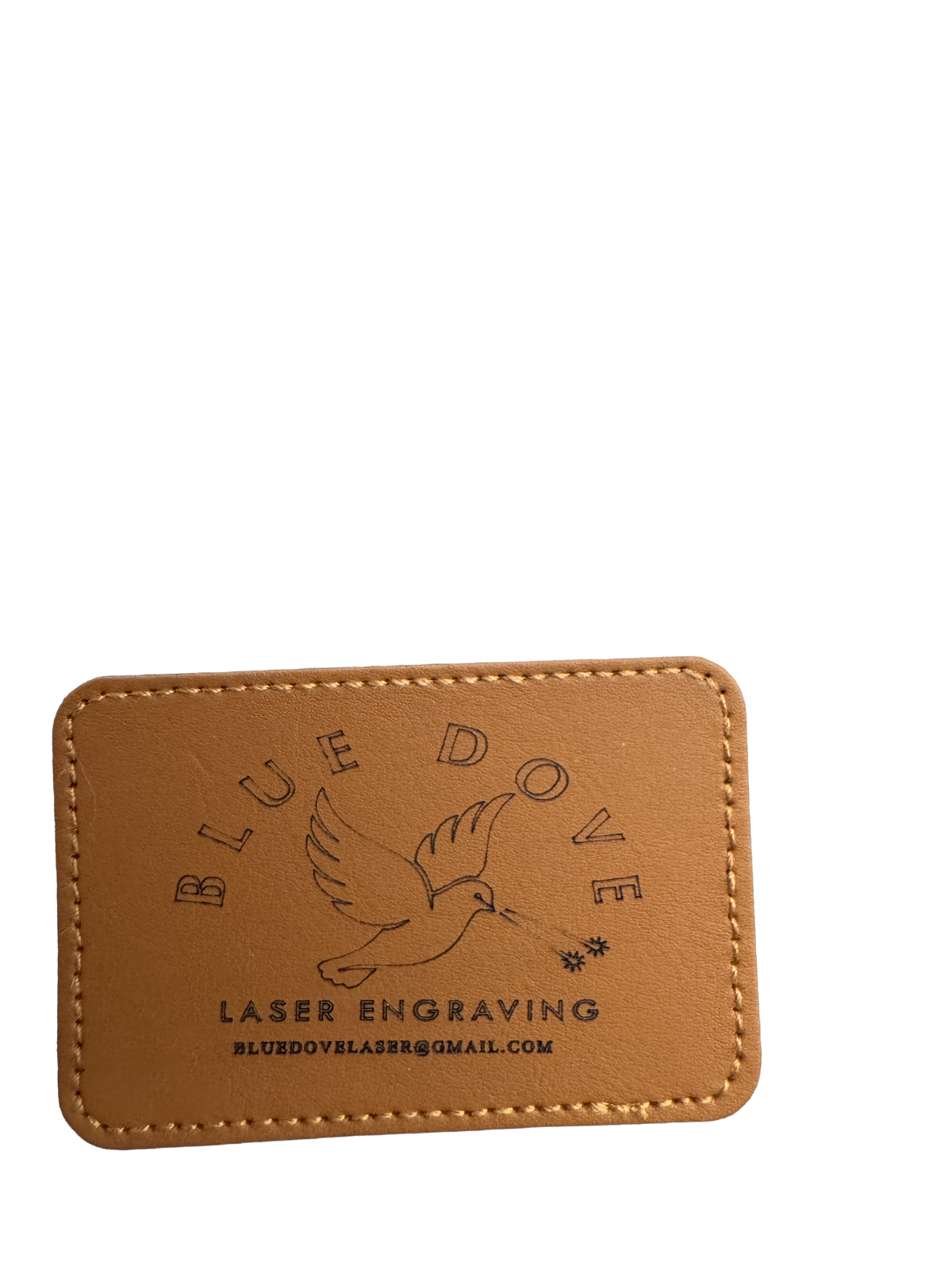 Blue Dove Laser Engraving custom leather patch with dove logo and stitched edge