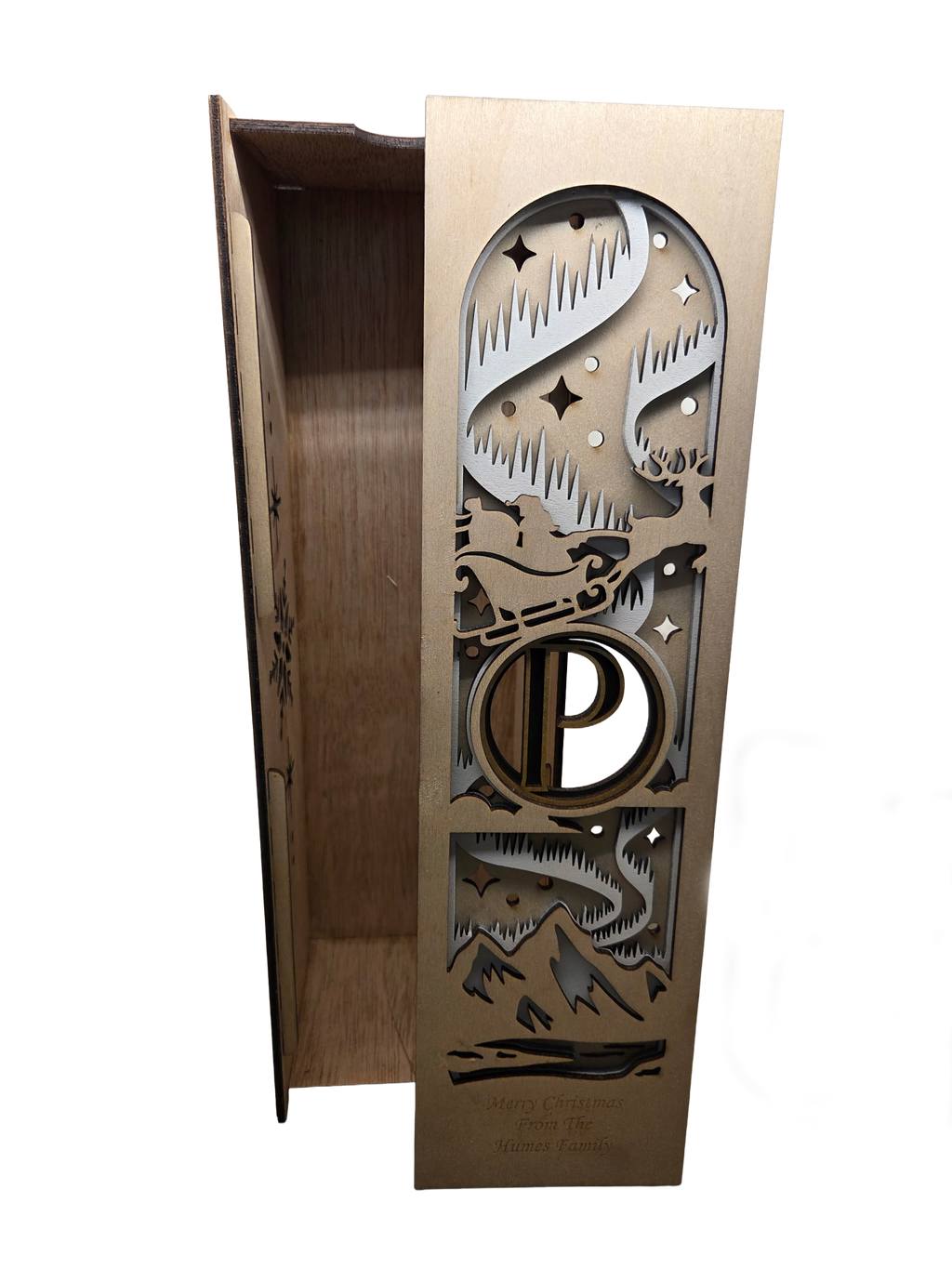 Laser-cut wooden wine box open showing interior — holiday scene design