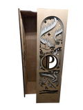 Laser-cut wooden wine box open showing interior — holiday scene design